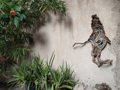 Wicked driftwood housefront wall art