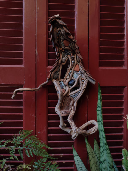 Wicked driftwood housefront wall art