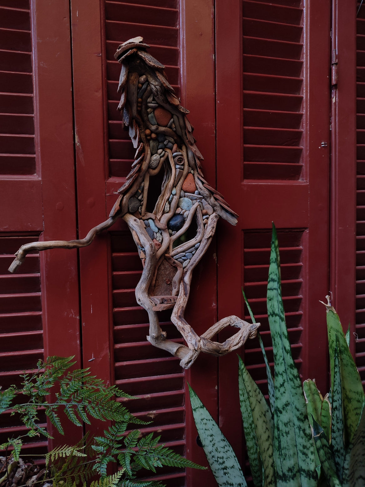 Wicked driftwood housefront wall art