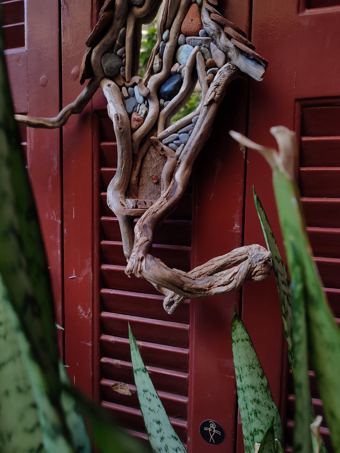Wicked driftwood housefront wall art