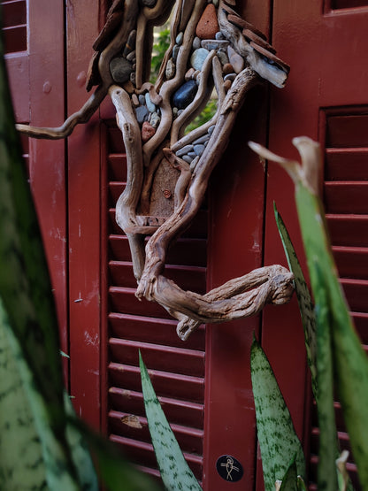 Wicked driftwood housefront wall art
